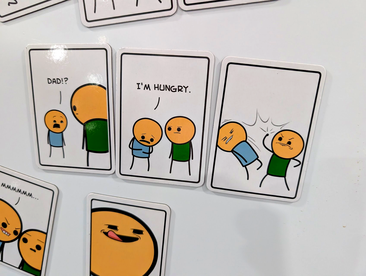 Joking Hazard fridge magnets on a fridge door